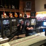 Kiefer Sutherland Instagram - Behind the scenes of 'Bloor Street - from the Recording Studio. I think the kids call this a #Photodump image 1 -  This is Chris Lord Alge and myself in the control room of his studio working on the final mix. Why I make stupid gestures with my hands will be a mystery to me ‘til the bitter end. image 2 -  Jess Calcaterra giving Cindy Vela percussion lessons… and loving it! image 3 -  Jim Scott’s Studio/vintage gear museum. Also has a bar, which I thought very civilized.   image 4 -  The irony of this photograph is that when I go to do a vocal I remove my glasses and this is literally what I see… Ha ha ha!