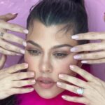 Kourtney Kardashian Barker Instagram - Behind the scenes from my new @lemme glow gummies campaign. (I was hiding a little 5 month baby bump on set 🤍) Lemme Glow is the ultimate beauty complex, scientifically formulated with Types 1 and 3 Collagen Peptides, Biotin, Zinc, Vitamins A, C & E and 72 Ionic Trace Minerals. 🍑✨✨