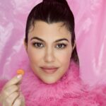Kourtney Kardashian Barker Instagram - Glow up alert! Lol 🍑✨ Lemme Glow has officially arrived on lemmelive.com.    We spent over two years perfecting this formulation, and it is the ULTIMATE beauty gummy for thicker, fuller hair and clearer skin… 💅🏼🎀   Fun fact: Our Glow collagen gummy contains a mineral complex with 72 ionic trace minerals from Utah's Great Salt Lake, giving you that radiant, dewy glow. ✨✨