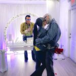 Kourtney Kardashian Barker Instagram – One year ago today, an Elvis impersonator married me and @travisbarker after the Grammys and way too much tequila in a chapel in Las Vegas! It was one of the best nights of our lives, dreaming of a lifetime filled with fun adventures together.  And yes, that’s me about to throw up on the floor in the car. 🥂 Thankful to @clemente_310 @kevinhwolff for all the iPhone footage so that I could remember the night 🪩🤪 also, I ended up losing this jacket that night, which I had for ten years, with the little cute heart studs and there’s a reward if anyone finds it 🕵🏻‍♀️