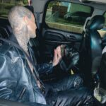 Kourtney Kardashian Barker Instagram – One year ago today, an Elvis impersonator married me and @travisbarker after the Grammys and way too much tequila in a chapel in Las Vegas! It was one of the best nights of our lives, dreaming of a lifetime filled with fun adventures together.  And yes, that’s me about to throw up on the floor in the car. 🥂 Thankful to @clemente_310 @kevinhwolff for all the iPhone footage so that I could remember the night 🪩🤪 also, I ended up losing this jacket that night, which I had for ten years, with the little cute heart studs and there’s a reward if anyone finds it 🕵🏻‍♀️