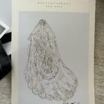 Kourtney Kardashian Barker Instagram - One year ago, we had our first in-person meeting with @dolcegabbana to start the design process of my wedding dress!! The first inspiration for my dress was when Travis and I were watching Guns N’ Roses November Rain video one night before we were even engaged, and we said to each other “this has to be our wedding.” She was wearing a short dress and I thought to myself “I need a short dress!” I had more visions inspired by some 1990s campaigns of Monica Bellucci shot by Helmut Newton for Blumarine. When we knew our wedding was going to be in Portofino, it also influenced the vibes and feeling of the dress. I also just wanted to feel like we ran off to Italy and got married and wanted the dress and wedding to feel that way! When @dolcegabbana suggested putting Travis’s head tattoo of the Virgin Mary on the handmade lace veil with the words from his tattoo: family, loyalty, respect underneath, I got chills and knew how special that felt. (And my little mini veil I wore to dinner ☺️) This was all planned and made into my dream come true all so so quickly and I’m so grateful to everyone who put their all into making it all happen! ✨🫶🏼❤️