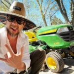 Kristen Holden-Ried Instagram - Oh I’ve got those summer vibes today!!! I’m pimpin’ on my John Deer with an early Friday beer compliments of @bellwoodsbrewpub And yes, you farmer fashion fanatics, the shirt is Armani 😜 Have a great weekend all ! #farmlife