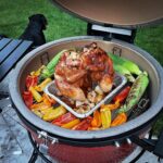 Kristen Holden-Ried Instagram - Thanks for the B-Day wishes all ! It was a lovely poolside day experimenting with the Big Joe :) Beer can chickens and pizza ?!? A good day indeed :) My pizza skills need some work as you can see… but tasted delicious ! #kamadojoe