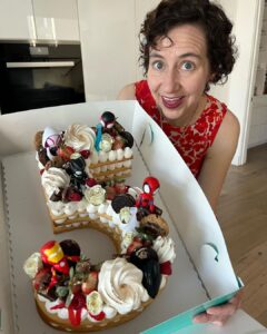 Kristen Schaal Instagram - My Ruby turned 5 and I got this gorgeous cake from @crumbles__patisserie! Thank you! They make fun cakes in Encino and they let us add Ruby’s favorite SpiderMan characters to take a much needed break fighting bad guys to celebrate. Happy birthday to Ruby!