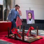 Kristen Schaal Instagram - Today I donated the first ever @hwdwalkoffame Foot Bridge at Andy Kaufman’s ceremony. My hope is that no one’s dirty feet, dog shit, bird shit, or gum will ever touch his precious star that took 40 years after his death to get. I also donated a rug to go over the bridge to keep it clean too. Thank you to Arturo Guzman and his friend for building it, Rich Blomquist for the rug idea (zoom in on rug), the Kaufman’s for letting me be a part of this historical event, and to Andy for the inspiration.