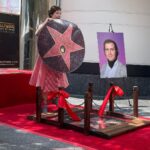 Kristen Schaal Instagram - Today I donated the first ever @hwdwalkoffame Foot Bridge at Andy Kaufman’s ceremony. My hope is that no one’s dirty feet, dog shit, bird shit, or gum will ever touch his precious star that took 40 years after his death to get. I also donated a rug to go over the bridge to keep it clean too. Thank you to Arturo Guzman and his friend for building it, Rich Blomquist for the rug idea (zoom in on rug), the Kaufman’s for letting me be a part of this historical event, and to Andy for the inspiration.