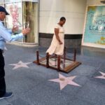 Kristen Schaal Instagram - Today I donated the first ever @hwdwalkoffame Foot Bridge at Andy Kaufman’s ceremony. My hope is that no one’s dirty feet, dog shit, bird shit, or gum will ever touch his precious star that took 40 years after his death to get. I also donated a rug to go over the bridge to keep it clean too. Thank you to Arturo Guzman and his friend for building it, Rich Blomquist for the rug idea (zoom in on rug), the Kaufman’s for letting me be a part of this historical event, and to Andy for the inspiration.