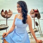 Kusuma Degalamari Instagram - Lost in blue, with flowers by the sea—a serene moment painted in simplicity and grace. Sea, sky, beach, blue dress, goa, throwback, flowers, ootd, vibe, photography, travel life, travel photography, holiday, vacation, actor, kusuma Kiki Goa