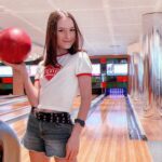 Lévanah Solomon Instagram - 🍒☎️📀🥤💋 C’est @elina.solomon_officiel qui a gagné la partie 🤡 📸 @karinesolomon _________ #bowling #picoftheday #photooftheday #vacation #holiday #80s #90s #retro #pink #orange #red #blue #aesthetic #photography #summer #mood #vibes #outfit #ootd #color #colors #girl Villages Nature Paris