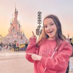 Lévanah Solomon Instagram - ✨I’m a DisneyGirl 💕 📸 @karinesolomon ___________ #disneylandparis #disney #travel #france #frenchgirl #disneyprincess #pink #white #yellow #neutral #castle #picoftheday #pictureoftheday #photography #photooftheday #sky #pastel #color #colorful Disneyland Paris