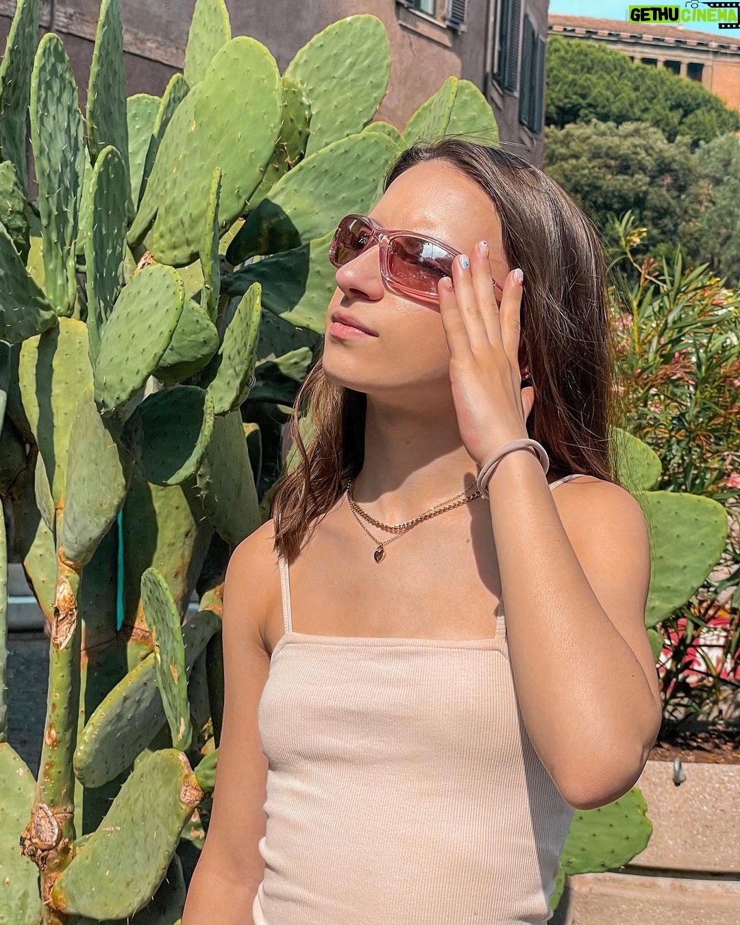 Lévanah Solomon Instagram - Je suis in love de ces photos 🌵🌸 De tous mes posts à Rome, tu préfères lequel ? *Photos retouchées ___________ #picoftheday #pictureoftheday #photography #photooftheday #travel #sky #italy #rome #beige #blue #green #pink #tan #aesthetic #mood #vibes #summer #colors #color #light #white #ootd #outfit #vacation #holiday #girl #neutral #dress #cactus Rome, Italy