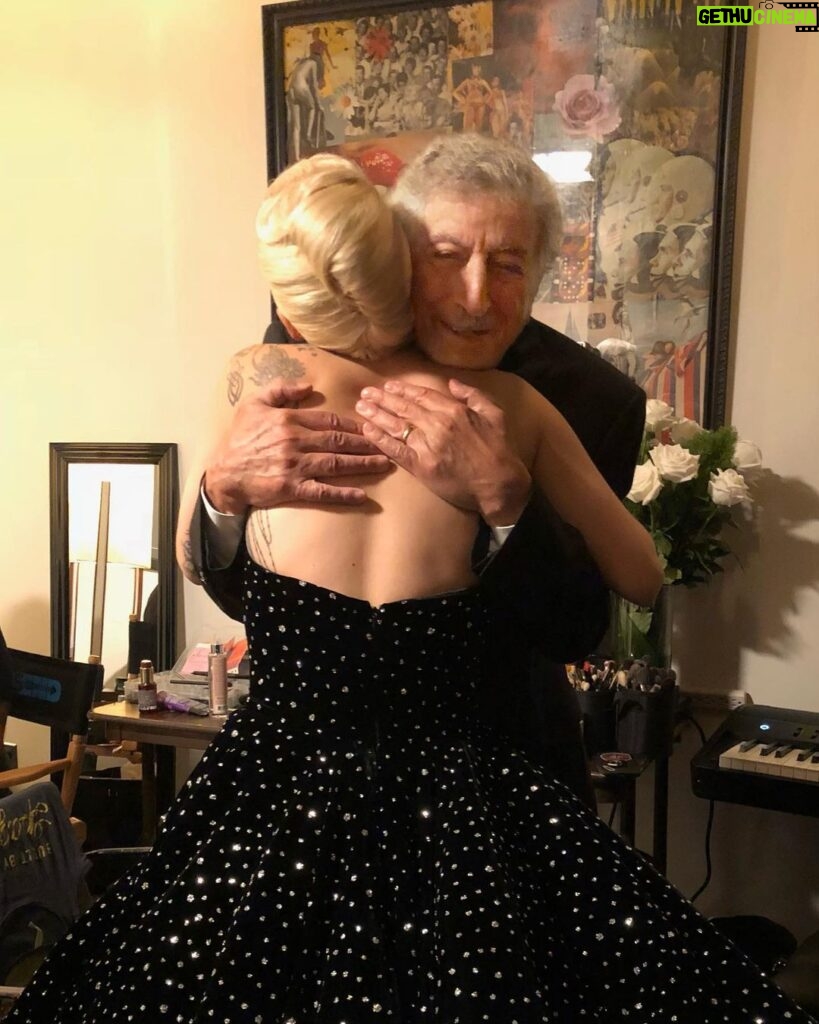 Lady Gaga Instagram - I will miss my friend forever. I will miss singing with him, recording with him, talking with him, being on stage together. With Tony, I got to live my life in a time warp. Tony & I had this magical power. We transported ourselves to another era, modernized the music together, & gave it all new life as a singing duo. But it wasnt an act. Our relationship was very real. Sure he taught me about music, about showbiz life, but he also showed me how to keep my spirits high and my head screwed on straight. "Straight ahead," he'd say. He was an optimist, he believed in quality work AND quality life. Plus, there was the gratitude...Tony was always grateful. He served in WWII, marched with Martin Luther King Jr., and sang jazz with the greatest singers and players in the world. I've been grieving the loss of Tony for a long time. We had a very long and powerful goodbye. Though there were 5 decades between us, he was my friend. My real true friend. Our age difference didn’t matter-- in fact, it gave us each something neither of us had with most people. We were from two different stages in life entirely--inspired. Losing Tony to Alzheimer’s has been painful but it was also really beautiful. An era of memory loss is such a sacred time in a persons life. There's such a feeling of vulnerability and a desire to preserve dignity. All I wanted was for Tony to remember how much I loved him and how grateful I was to have him in my life. But, as that faded slowly I knew deep down he was sharing with me the most vulnerable moment in his life that he could--being willing to sing with me when his nature was changing so deeply. I'll never forget this experience. I'll never forget Tony Bennett. If I could say anything to the world about this I would say don’t discount your elders, don’t leave them behind when things change. Don’t flinch when you feel sad, just keep going straight ahead, sadness is part of it. Take care of your elders and I promise you will learn something special. Maybe even magical. And pay attention to silence—some of my musical partner and I’s most meaningful exchanges were with no melody at all. I love you Tony. Love, Lady