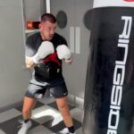 Liam Williams Instagram - Absolute killer session this morning 🥵 - Oscar’s first time at the gym to watch me train & he loved it , proud moment 💙 - #machine Cardiff