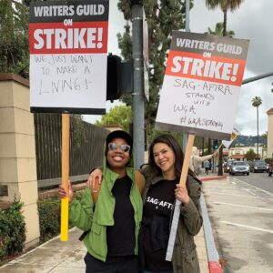 Lilan Bowden Instagram - WRITER’S STRIKE: We are #wgastrong !! 

The Writer’s Guild of America is on strike for FAIR WAGES and streaming protections and this is important because without writers, there would be no stories, and there would be no jobs for the people who tell these stories. As an actor and director, I stand with the WGA because I know how valuable their livelihood is to mine and to all of us who enjoy TV and film content. This first picture is of me and @dionareasonover , who without her writing I wouldn’t have had a job on NCIS.

The next pic is of me and WGA Strike Captain/writer on Abbott Elemetary, @bishilarious . Follow her here and on Twitter cause she’s a 100% badass and a political leader for all things good.

Many TV writers cannot afford to make rent even after writing on hit TV shows. The demands of writers are simple and fair: profit sharing and transparency for streaming, a fair number of writers in rooms, to not be replaced by AI, are some. The entire collective of writers are asking for a total of 2% of studio profits to be shared to be able to make a living. I think this is: very reasonable!! 

Some info about the writers strike attached and follow @writersguildwest for more info on the strike in general. People in entertainment WANT to get back to work and we want to be paid fairly for our work!! Let’s go @writersguildwest , all the Hollywood unions are with you ✊🏼