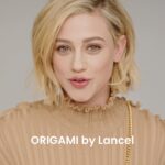 Lili Reinhart Instagram – Very happy to introduce the new Lancel “Origami” bag line, the perfect bag for a walk in Paris.
Available tomorrow, stay tuned!
#LancelParis #LiliForLancel #LancelTwist #OrigamiByLancel
