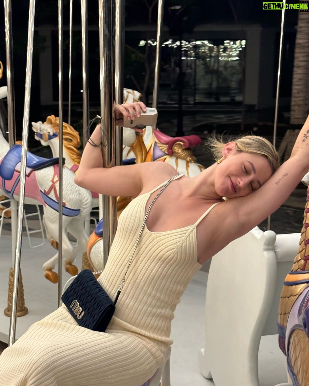 Lili Reinhart Instagram - @garzablanca.cancun #garzablancalife #garzablancacancun Merry-go-round on site, for your inner child. 🦄