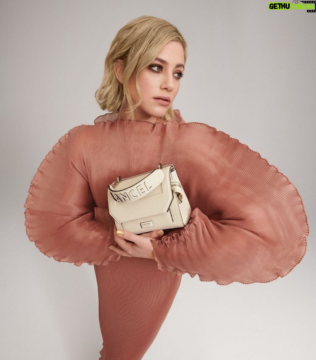 Lili Reinhart Instagram - Meet Ninon, the iconic bag from Maison Lancel. And it’s very fun to say with a French accent. I loved being a part of this campaign with @lancelparis, still pinching myself ❤️ #lancelparis #liliforlancel #lanceltwist #lancelpartner #NinonByLancel
