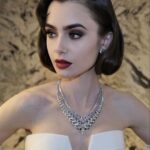 Lily Collins Instagram - @Lancomeofficial close ups last night for The #MetGala’s Ode to Karl. Thank you to my genius glam team @fionastiles and @gregoryrussellhair for bringing this classic look to life. Your artistry always floors me. More to come…