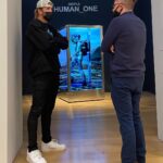 Logan Paul Instagram - #1 ORIGINAL_ONE feat. @Beeple_Crap SOLD for 25 Eth — $59k USD Perks: - Holder receives NFT & physical 1/1 Polaroid - 100% of proceeds donated to Ukraine War relief effort - 1/99 Membership & Voting Right in Originals DAO “Digital art pioneer, Mike Winkelmann (most famously known as “Beeple”), stands in front of his most ambitious piece to date, HUMAN_ONE, at Christie’s Auction House in NYC. The installation sold for $28.9M just days later.” originals.com (bid here, link in bio)