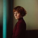 Louise Brealey Instagram – My new headshot. In it I also have shoulders and indeed some of a torso. I love @philsharp. He is basically the best; he paints photos like a Dutch master. This is in loving memory of my burgundy jumper which has since been gobbled by tineola bisselliella, the jumper-munching little fucks. Look at my great hair. Here I am also seen honouring my boyfriend’s team, Aston Villa. #utv #headshot #headandshouldersshot #castmeinsomethingwhileihavegreathairfortheloveofgod