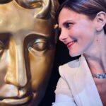 Louise Brealey Instagram - Let the games begin. #baftacymru #baftacymruawards #presenting #gulp Dazzling ivory suit by the amazing @thefoldlondon. Vintage topaz, diamond & silver collar from the glorious @susannahlovisjewellers in Burlington Arcade. Big gold face, @baftacymru. Makeup - @beautybyceri Haircut - @tracey_cahoon_hair_ Hair styling - Tara @popcornhairstudio All the credit, as always, to @mary_fellowes 💕 (PS you can’t see my dreamy black slingbacks by @rosamund.muir, who makes absolutely beautiful shoes. #sustainablefashion) Celtic Manor, Newport, South Wales