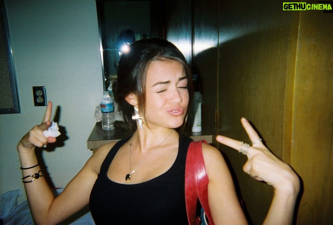 Lucy Hale Instagram - the year was 2006. were you really living if you weren’t posing like this? i wore my true religions with a low slung belt everyday. i loved my tMobile sidekick and Ryan Cabrera. @thisisrozzi going into the archives with these.
