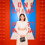 Lucy Hale Instagram - Celebrating @Longchamp’s new collection with Robert Indiana ♥️ Thank you for having me for such a special NYC evening ! #LongchampxRobertIndiana #LongchampPartner © Morgan Art Foundation, LLC. Licensed by Artestar, New York.