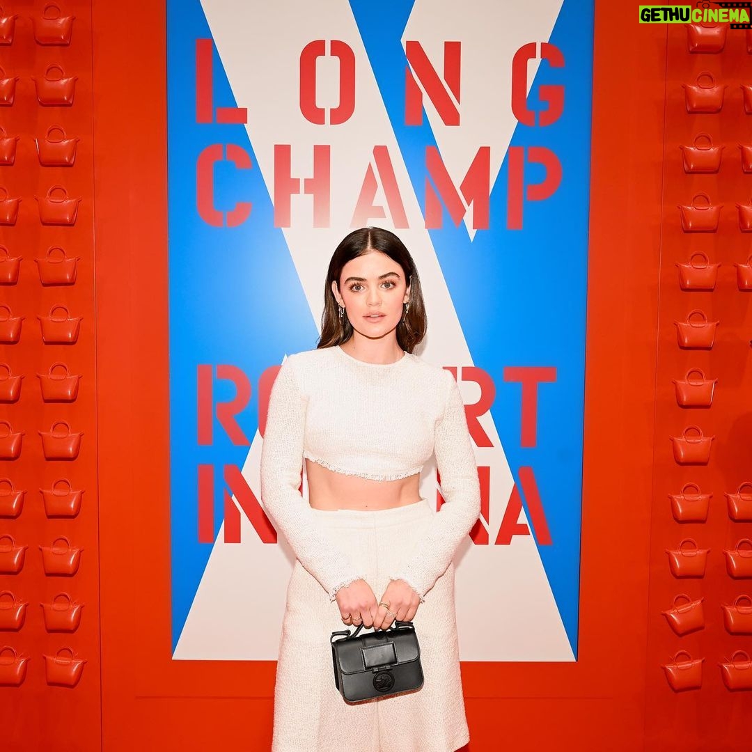 Lucy Hale Instagram - Celebrating @Longchamp’s new collection with Robert Indiana ♥️ Thank you for having me for such a special NYC evening ! #LongchampxRobertIndiana #LongchampPartner © Morgan Art Foundation, LLC. Licensed by Artestar, New York.