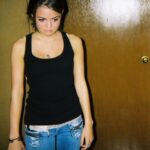 Lucy Hale Instagram - the year was 2006. were you really living if you weren’t posing like this? i wore my true religions with a low slung belt everyday. i loved my tMobile sidekick and Ryan Cabrera. @thisisrozzi going into the archives with these.