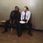 Malik Yoba Instagram - One of the best parts of being an actor and working with your fellow artists through scenes is the thoughtful consideration we give to each moment before the cameras roll. Always seeking the truth to bring life to the words on the page. The story , behind the story of our human existence and experiences. Capturing and embodying that truth and just live in the moment and let spirit take you where it wants to. Staying obedient. This moment caught between takes with @donniewahlberg by the writer @i_biederman1981 of episode 1 of season 14 of @bluebloods_cbs captures this dynamic. Had no idea he took the shot but glad he did and thanks for sharing it @donniewahlberg . Always good rocking witchu homie!! #setlifeisback 🎬 Brooklyn, New York