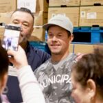 Mark Wahlberg Instagram - What a turn out!! In the rain @costco 🔥🥃📈 @flechaazultequila 🥃🥃💯 the #1 sipper💯
