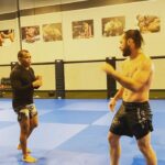 Markus Perez Instagram - 🇺🇸 DEFENSE OF SINGLE LEG GOING TO HEEL HOOK 🇧🇷 DEFESA DE SINGLE LEG INDO PARA A CHAVE DE CALCANHAR FLYING HEEL HOOK WITH MY FRIEND UFC FIGHTER @massarandubamma VLW MANO #singlelegdefense #heelhook #jiujitsu #wrestling #mmteam American Top Team