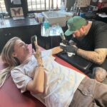 Marlee Matlin Instagram - What a great time with @lukewessman who beautifully tatted me, and my two daughters @sarahgrandalski @isabelle.grandalski….I got the “ one day at a time/date of my sobriety and the infinity symbol. ( the girls got the same as I did ) Sarah got three tats…and isabelle got her first two tats. And @bobbyhundreds made a surprise visit and made our day extra special! Love my friends Luke and Bobby and blessed to have spent the day with my daughters. Yes, more tattoos to come. #tattoos #addicted #friends #family 🤟🏼🤟🏼
