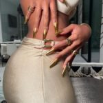 Megan Thee Stallion Instagram – We had this SS 1997 @pacorabanne sitting in the closet waiting for the perfect moment! Love you @luxurylaw thank you @juliendossena