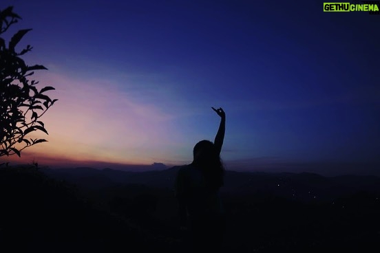 Megha Thomas Instagram - You are doing good baby ✨ P.C. @harikrisshnan (thank you🌸) #birthdaygirl #birthdayevening #sunset #sunsetlover #shootinglocation #lovemyjob #newplace #skyshot #skycolors #colours Vandiperiyar, Kerala, India