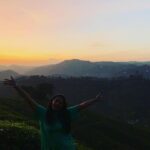 Megha Thomas Instagram - You are doing good baby ✨ P.C. @harikrisshnan (thank you🌸) #birthdaygirl #birthdayevening #sunset #sunsetlover #shootinglocation #lovemyjob #newplace #skyshot #skycolors #colours Vandiperiyar, Kerala, India