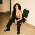 Mette Towley Instagram - PUT A BOW ON IT! Last weekend we wrapped the UK tour… I opened for @jessieware in front of 20,000 beautiful people @yourallypally. I spent the week hustling under spotlights in Manchester and Glasgow. Delivering my music & message to new audiences is my kind of ENERGY. GREATFULL TO MY INCREDIBLE BAND @daynajfisher @joyjmusique_concrete @moslicks for rocking with me. Thank you Jessie for welcoming me with open arms! A MASTERCLASS… WHAT A TIME TO BE ALIVE! 🖤 honored to be adorned by the inspiring #sarahburton @alexandermcqueen. all photography by the @zacmahrouche