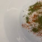 Michael Voltaggio Instagram - @bryanvoltaggio and I have been cooking long enough that the once hyper modern technique of spherification is now retro. avocado confit in a low temp oven in onion oil, the “pit” is a black garlic vinaigrette sphere, lemon gel, sea bean powder. maybe gonna serve with a nice piece of crusty toast. in development for retro by voltaggio @mandalaybay