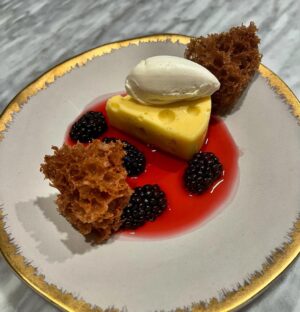 Michael Voltaggio Instagram - Lemon curd made with cream cheese instead of butter = lemon curd cheesecake 

600g lemon juice
600g sugar 
6 eggs 
6 egg yolks 
8 sheets gelatin 
600g cream cheese 
2 scraped vanilla beans 
Heat lemon juice, vanilla bean, and sugar to 180f, add bloomed gelatin leaves, temper in eggs, cook on double boil until coats a spoon, mix in mixer with cream cheese, pour into fancy cheese shape molds bought from Amazon, freeze, remove from mold, defrost, eat with sauce and fruit and stuff