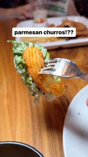 Michael Voltaggio Instagram - When you see Caesar salad on a menu, you don’t expect much. It’s a classic no doubt, but when I read “parmesan churros” I knew I was in a for a treat 🤯  Need a bag of these ASAP! Only at Retro by Voltaggio inside @mandalaybay 🥗🧀