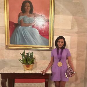 Michelle Obama Instagram - It was so wonderful to see @MindyKaling honored with the National Medal of Arts by President Biden this week for her trailblazing work across television, film, and books. 
 
In #TheLightWeCarry, I write about Mindy in a chapter that explores the feeling of being an “other” or an “only” that many of us experience. Sometimes it's because of our race or ethnicity; other times it’s our gender; for me growing up, it was my height. Whatever the reason, those differences that make us stand out and often lead us to shrink ourselves. 
 
When Mindy started on The Office, she was twenty-four-years old and the only woman and person of color writing on the show. Now, Mindy could have decided to let those feelings of doubt take over, but she didn’t. She stepped forward. She endured the discomfort of being an “only,” drilled down on the work, and because of that—she was able to make more space for others coming up behind her, creating room for more storytellers and more stories along the way.
 
Since then, she’s become a powerhouse in her field, creating, producing, writing, and starring in multiple hit TV shows and movies, nearly all of which feature the stories of women of color. With her work, she’s widened the sphere for belonging and empowering so many women along the way by allowing themselves to be seen. Congrats on the award, Mindy! You deserve it. #WomensHistoryMonth