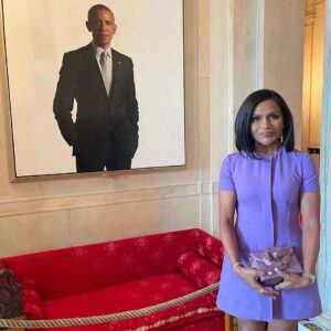 Michelle Obama Instagram - It was so wonderful to see @MindyKaling honored with the National Medal of Arts by President Biden this week for her trailblazing work across television, film, and books. 
 
In #TheLightWeCarry, I write about Mindy in a chapter that explores the feeling of being an “other” or an “only” that many of us experience. Sometimes it's because of our race or ethnicity; other times it’s our gender; for me growing up, it was my height. Whatever the reason, those differences that make us stand out and often lead us to shrink ourselves. 
 
When Mindy started on The Office, she was twenty-four-years old and the only woman and person of color writing on the show. Now, Mindy could have decided to let those feelings of doubt take over, but she didn’t. She stepped forward. She endured the discomfort of being an “only,” drilled down on the work, and because of that—she was able to make more space for others coming up behind her, creating room for more storytellers and more stories along the way.
 
Since then, she’s become a powerhouse in her field, creating, producing, writing, and starring in multiple hit TV shows and movies, nearly all of which feature the stories of women of color. With her work, she’s widened the sphere for belonging and empowering so many women along the way by allowing themselves to be seen. Congrats on the award, Mindy! You deserve it. #WomensHistoryMonth