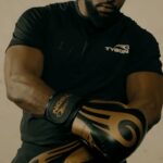 Mike Tyson Instagram - Elevate your game and train in style with the new Tyson Pro Performance Apparel and Hook Series Gloves. Available Now. Tag us sporting your Tyson Pro gear for a chance to be featured in our story. #TysonPro #HookSeries #performanceapparel