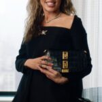 Miley Cyrus Instagram - “In ‘The Princess Diaries’ they say a queen never jingles,” says @MileyCyrus as she pulls out her monogrammed @LouisVuitton wallet while showing @BritishVogue what’s in her @Versace Greca Goddess bag. “So I have no coins… Just lots of plastic.” Miley’s other daily essentials? Her blinged out phone, a Biba De Sousa serum to keep her “hydrated and gorge”, and her favourite @DolceGlow self-tan. Watch the full film at the link in bio. Featuring: #MileyCyrus Director: @MaxBartick Director of Photography: @RachelBatashvili Editor: @Llllllllllllyd Director of Creative Production: @TheRealMinnieCarver Producers: @GeorginiaButz, @QiearaNicole and @JERocchi Stylist: @BradleyKennethStyle Make-up Artist: @JamesKaliardos Hairstylist: @BobRecine Manicurist: @JinSoonChoi Prop Stylist: @TaylorVincentHorne Location: @RitzCarltonNewYorkNomad [Video description: Footage shows Miley Cyrus, a white woman, standing in a hotel room wearing a black Versace minidress. She is holding a black Versace Greca Goddess handbag and, from it, pulls out a monogrammed Louis Vuitton wallet, her iPhone in a bedazzled case, a Biba De Sousa serum and a Dolce Glow self-tan.]