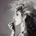 Miley Cyrus Instagram - “I carried some guilt and shame around myself for years because of how much controversy and upset I really caused,” @BritishVogue’s June 2023 cover star @MileyCyrus says. “Now that I’m an adult, I realise how harshly I was judged. I was harshly judged as a child by adults and now, as an adult, I realise that I would never harshly judge a child.” Click the link in bio to read the interview, and see the full story in the new issue, on newsstands Tuesday 23 May. #MileyCyrus wears all @ChanelOfficial, photographed by @StevenMeiselOfficial and styled by @Edward_Enninful, with hair by @GuidoPalau, make-up by @PatMcGrathReal, nails by @JinSoonChoi, entertainment director-at-large @JillDemling and production by @ProdN_ArtAndCommerce. [Image description: Black and white image shows a close-up of Miley Cyrus’s face in profile. Miley, a white woman, is pulling one strand of her hair down over her face to touch her tongue. A large flower-shaped Chanel earring with drop details and double C logos is visible in her left ear, which is turned to the camera.]