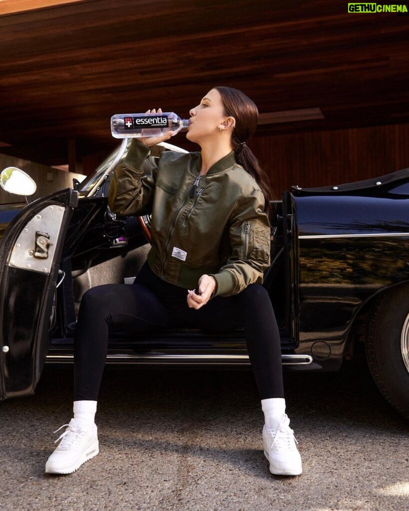 Millie Bobby Brown Instagram - Ambition never sleeps, and neither does @essentiawater #OverachievingH2O 💧 In the comments below, tell me one thing you’re going to accomplish before the end of 2023 ⬇️ Stay hydrated! ❤️🖤 #EssentiaPartner