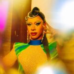 Miss Abby OMG Instagram – We don’t come to play around honey. 🐝  Feeling my ultimate Brazilian high class look in my night out. 💚🇧🇷💛
Photo: @rachelecclestone @3xnyx 
Hair: @wigsbysire 
Outfit: @the_drag_room 
Lashes: @gayamua 
Lips: @cursedcosmetics_ 
Face: @benefitnetherlands @kryolanofficial 
#missabbyomg #hostedbyabby #brazilianqueen #yellowgreenblue #brazilian #dragqueen #drag #dragmakeup #dragexcellence Club NYX