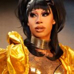 Miss Abby OMG Instagram - She’s a golden doll!🌅🕌🛖 Some people will hate you simply because they see you enjoying the success they don’t have from the work they haven’t done…🤭🌅 Pic: @cyrieljacobs @stunnin.mag Hair: @gayamua @thedragsalon #dontbejelly #befierce #goldengirl #blackhair #cleopatra #braziliangirl #tattoos #rhinestones #Drag #dragraceholland #missabbyomg #abbyomg The Golden City
