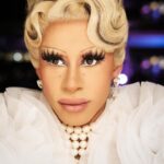 Miss Abby OMG Instagram - Remember, if you ever need a helping hand, it’s at the end of your arm. As you get older, remember you have another hand: The first is to help yourself, the second is to help others.🤍 Normally i would wear contact lenses in drag but for once i went “natural” with it! What do you guys think?🥹✨🤍 📸: @janalaemmerer #missabbyomg #abbyomg #natural #dragqueen #white #spartacuscruise #pearls #blondewig Adriatic Sea